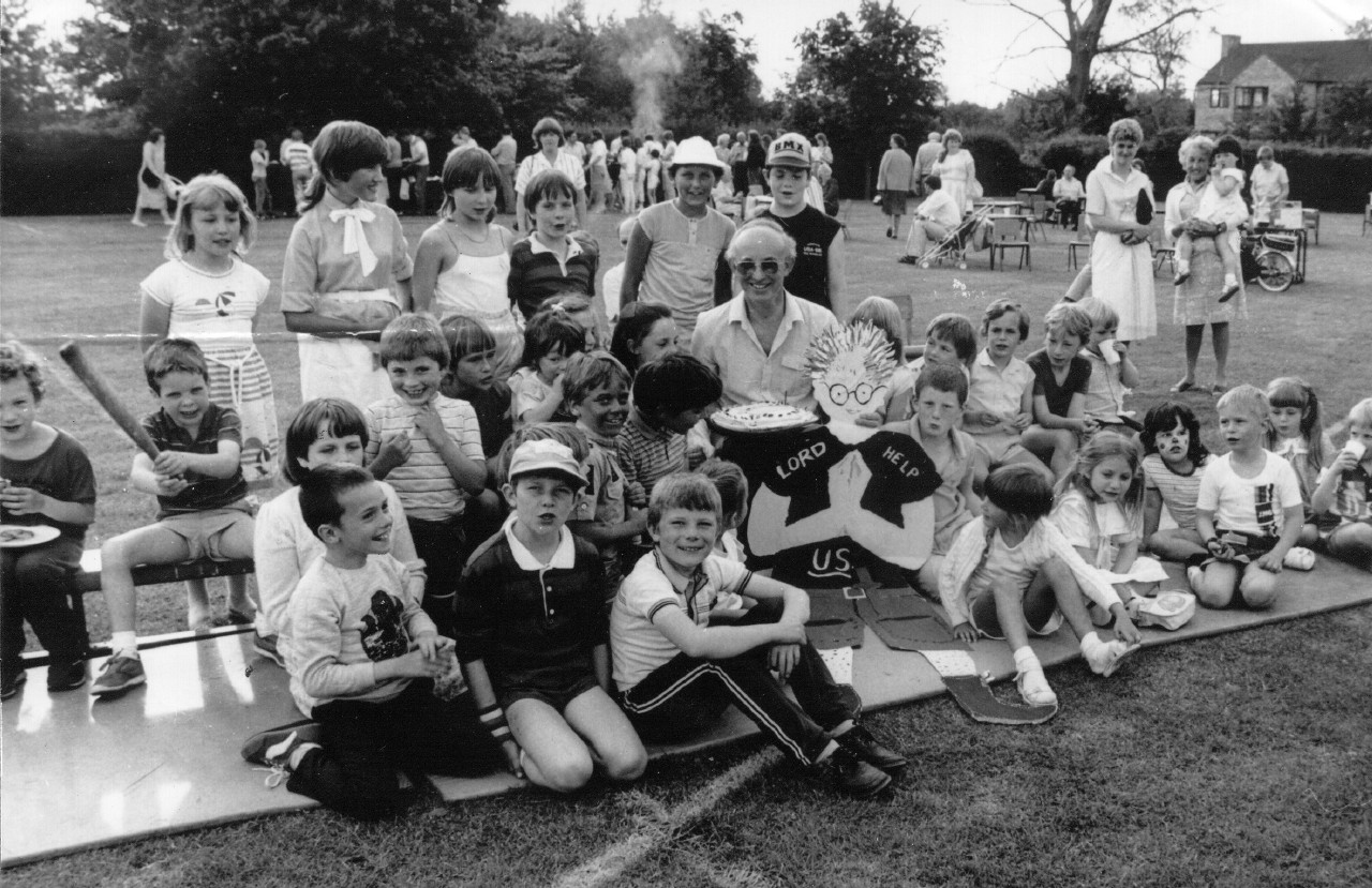 Reverend John Askey with children 1987