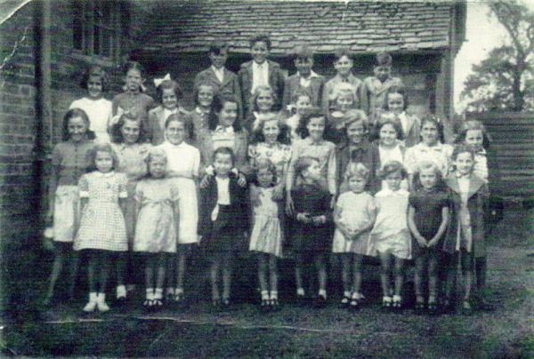 Children and teachers in 1948