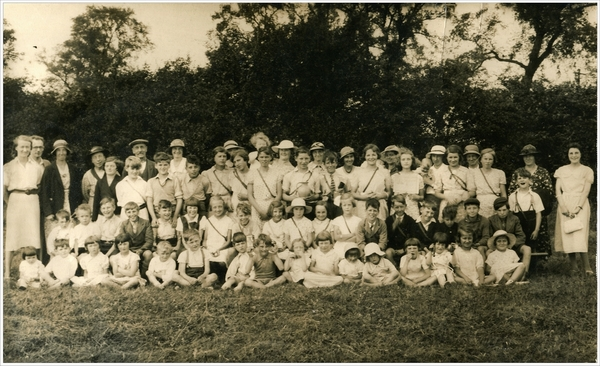 Village photograph 1939, with older Children carrying gas masks